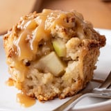 Delicious scone-style muffins filled with tart apples and topped with glossy caramel sauce.
