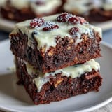 Rich, fudgy brownie bites topped with smooth cream cheese frosting and festive patriotic sprinkles.  