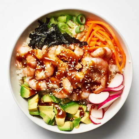 Close-up of a vibrant Shrimp and Avocado Sushi Bowl, ready to be enjoyed.