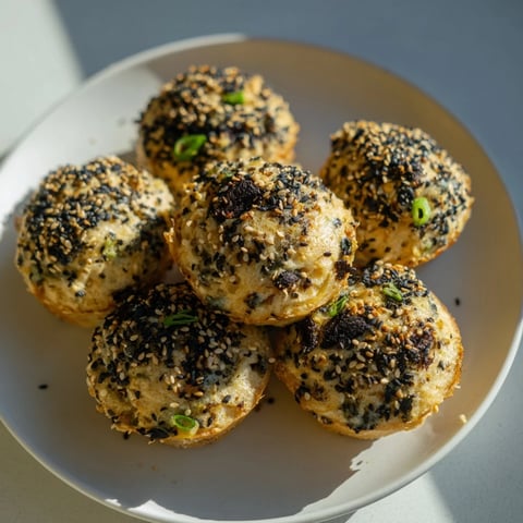 Savory Japanese Furikake Mushroom Muffins topped with sesame seeds, perfect for breakfast.  