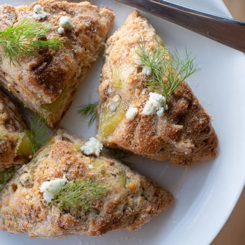 Savory Dill Pickle Buffalo Ranch Churro Cake Scones topped with cinnamon-sugar glaze.  