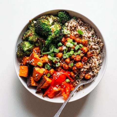 Vibrant Bold Sauce Drizzle Bowls topped with roasted veggies and silky sauces.  