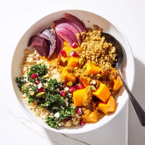 A vibrant Spiced Winter Bowl filled with roasted veggies and creamy ube-coconut purée.  