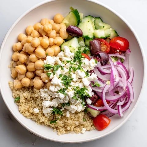 Mediterranean Chickpea and Feta Bowl, a colorful, savory mix of chickpeas and vegetables, ready to enjoy.