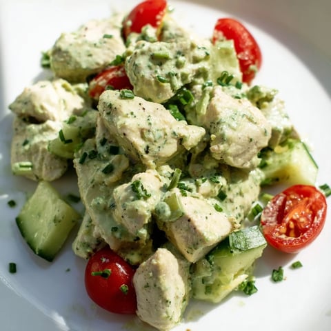 Creamy avocado ranch dressing coats tender chicken chunks, cherry tomatoes, cucumber, and crisp greens in this refreshing Avocado Ranch Chicken Salad.  