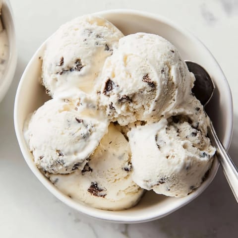 Delicious cottage cheese ice cream topped with chocolate chip cookie dough goodness.  