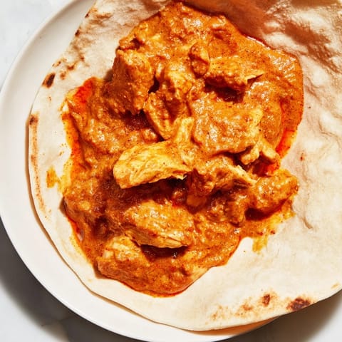 These flavorful Sticky Chicken Tikka Masala Tacos feature a delightful fusion of Indian-Mexican cuisines.