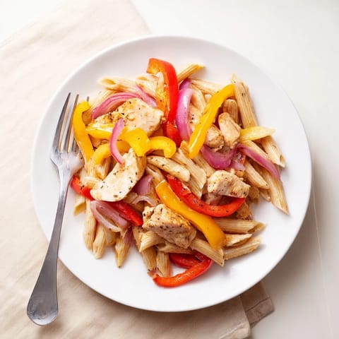 Golden chicken strips and colorful peppers toss with whole wheat penne in a lighter Cajun cream sauce.