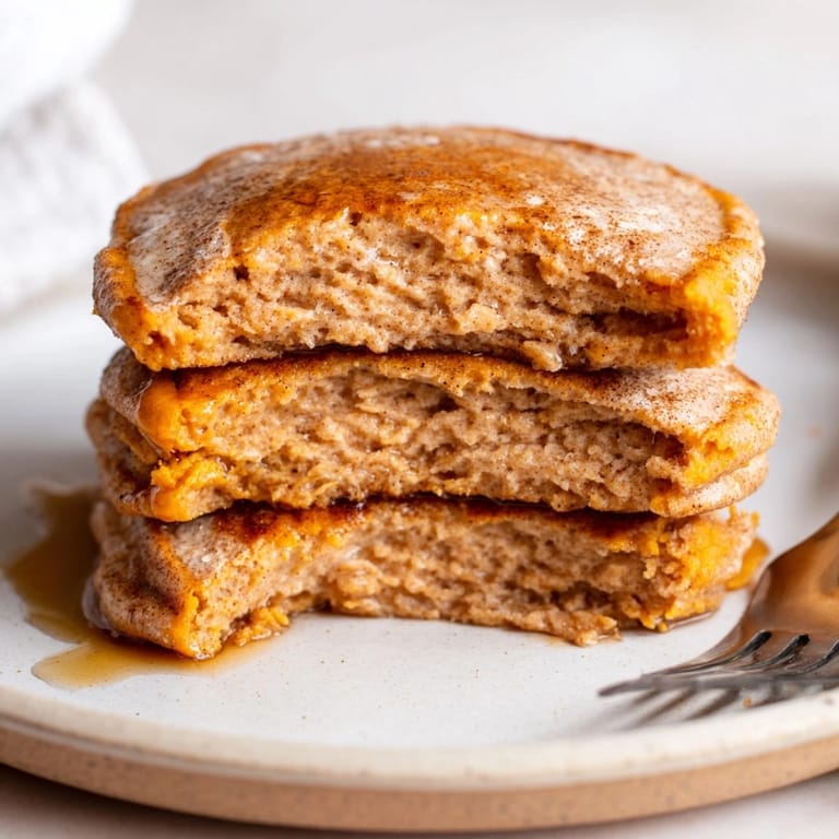 Healthy breakfast: Cinnamon Sweet Potato Protein Pancakes steaming gently, ready to fuel your morning.