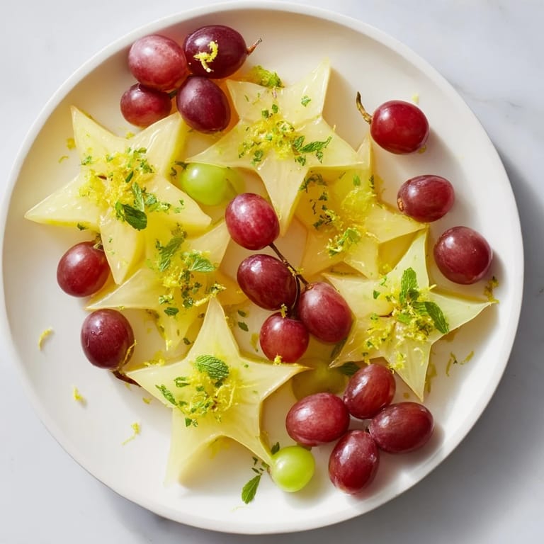 Bright starfruit slices and halved grapes create an easy, delicious, and colorful brunch garnish.